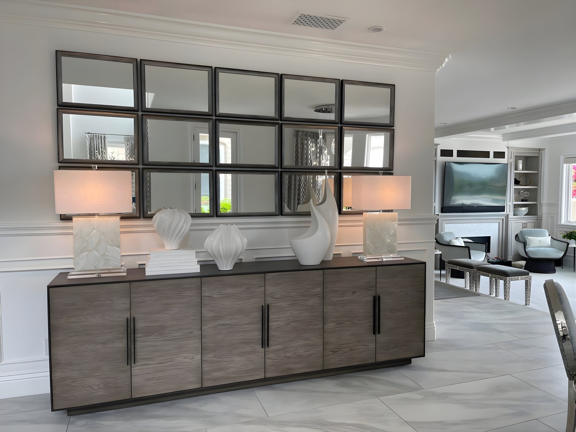Entry with mirror grid wall and walnut credenza